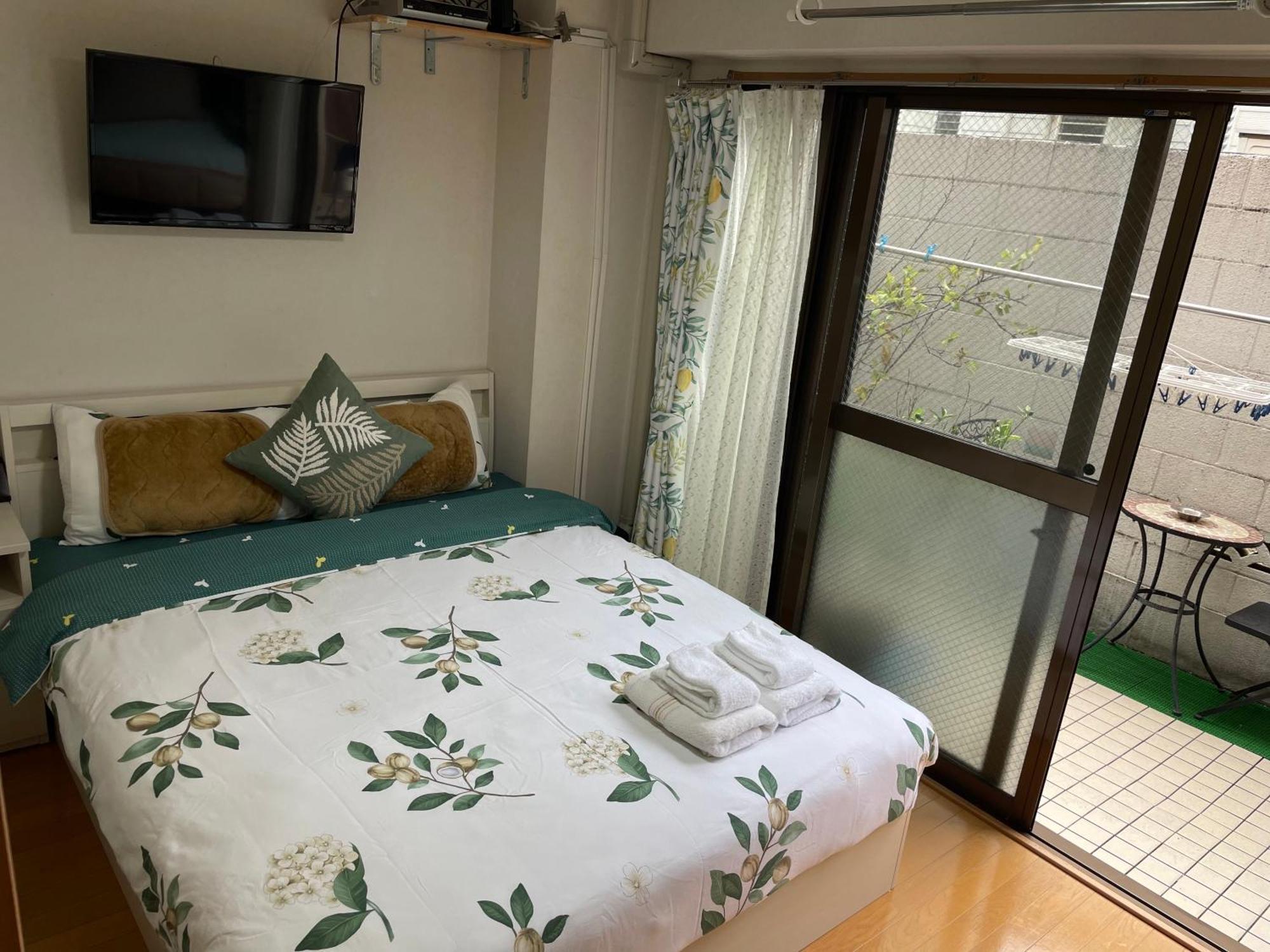 Apartemen 新宿庭院の屋-shinjuku Garden -28 Square Meters King Size Bed Garden